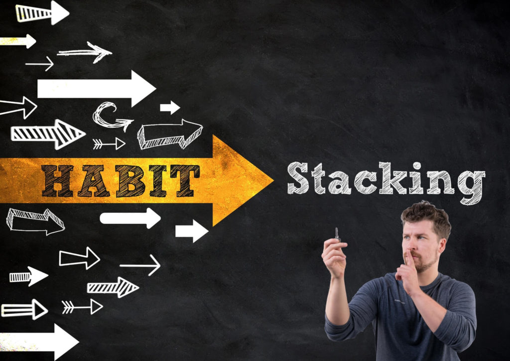 Will holding a key overlayed on a habit stacking graphic - top tip for online entrepreneurs