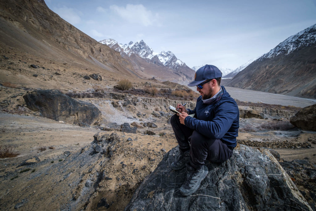 Will Hatton writing his personal manifesto in the mountains of Pakistan
